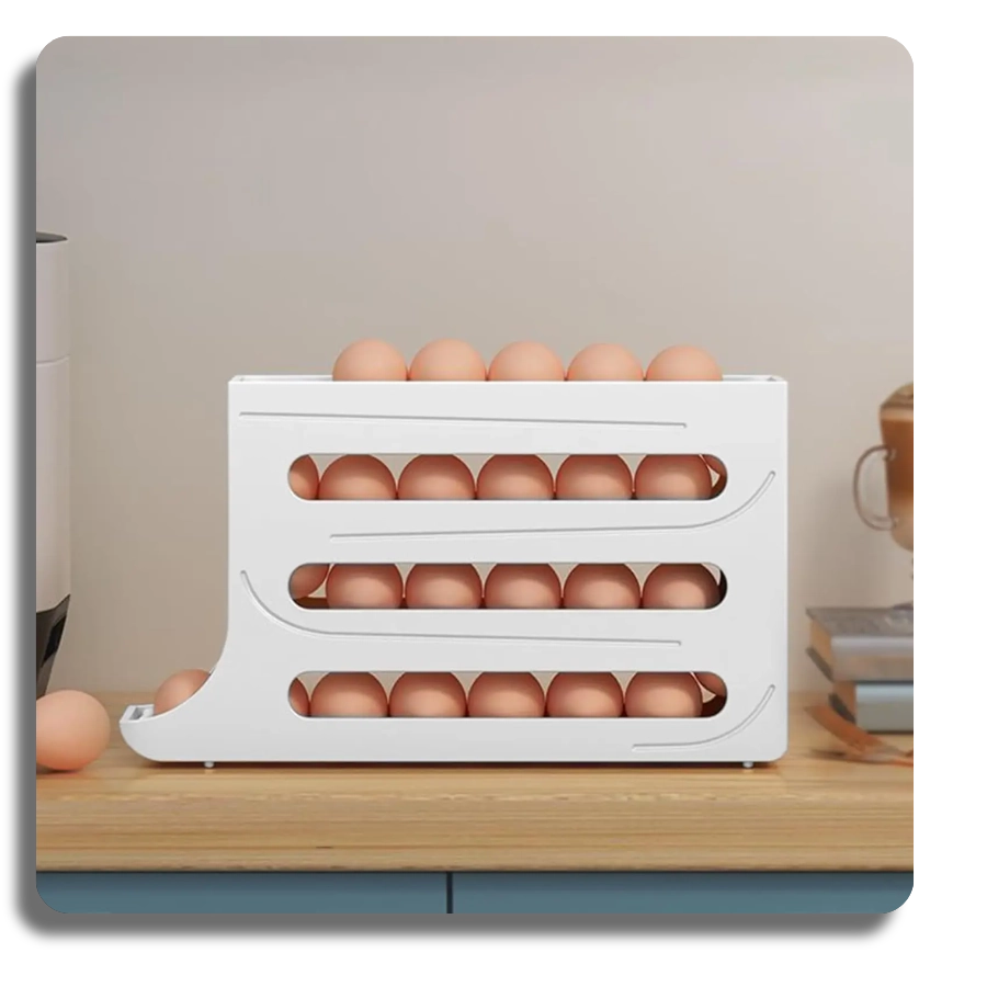 Side view of a white gravity-fed egg rolling holder on a wooden kitchen countertop, showcasing vertical space-saving storage.
